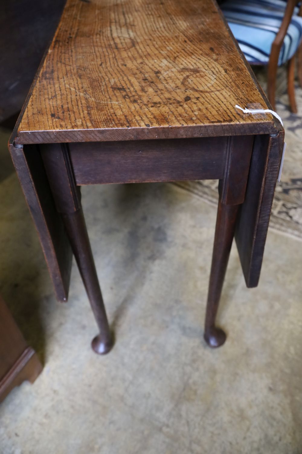 A mid 18th century oak pad foot drop leaf dining table, 110cm, extended, width 92cm, height 72cm